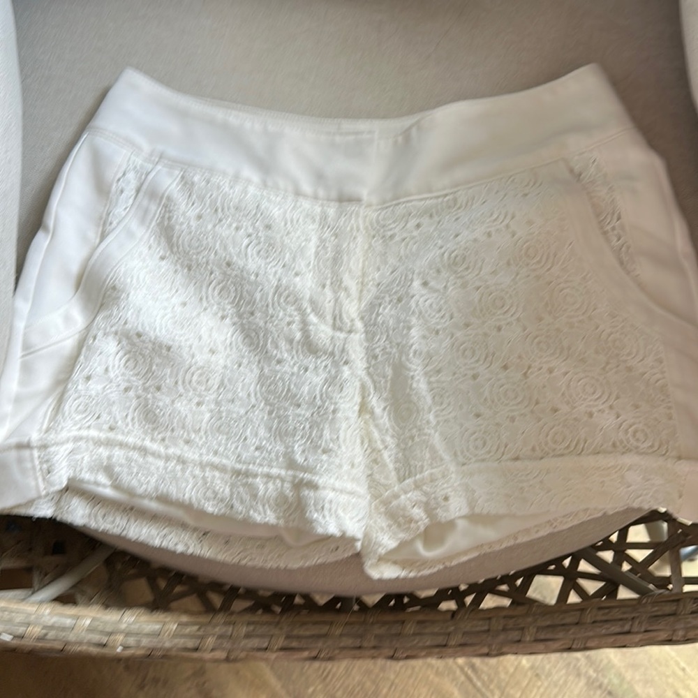 Maurice’s white shorts